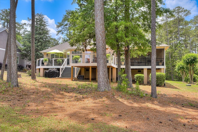 267 Fairway Dr, Mccormick, SC 29835 - rear view of property with a sunroom, a deck, stairs, and roof with shingles