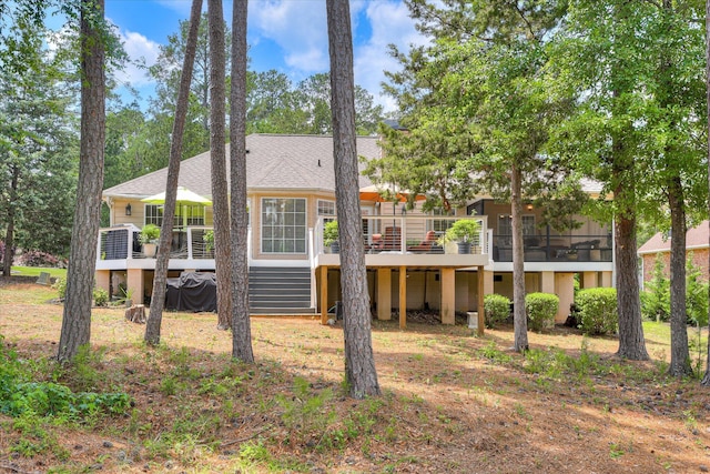 267 Fairway Dr, Mccormick, SC 29835 - back of property with a deck, stairway, a sunroom, and roof with shingles