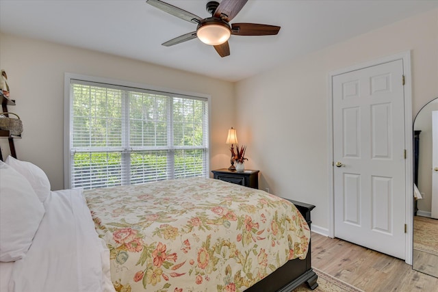 267 Fairway Dr, Mccormick, SC 29835 - bedroom featuring light wood-style flooring, a ceiling fan, and baseboards