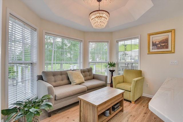 267 Fairway Dr, Mccormick, SC 29835 - living area with a chandelier, light wood-style floors, and baseboards