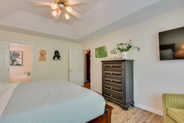 267 Fairway Dr, Mccormick, SC 29835 - bedroom with light wood-style flooring, a tray ceiling, baseboards, and a ceiling fan
