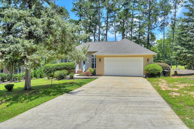 267 Fairway Dr, Mccormick, SC 29835 - view of front of home featuring a front yard, a garage, concrete driveway, and roof with shingles