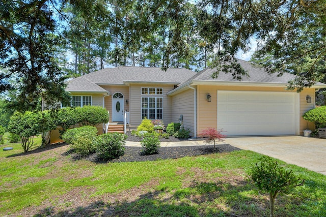 267 Fairway Dr, Mccormick, SC 29835 - view of front of home featuring a garage, driveway, and a shingled roof