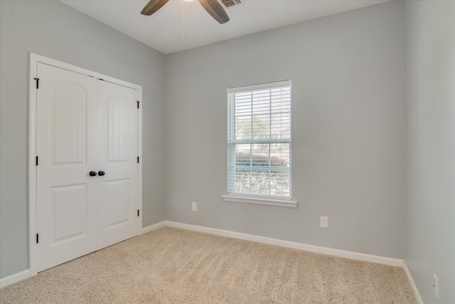 4909 Ashbrooke Way, Grovetown, GA 30813 - unfurnished bedroom with carpet, a closet, and ceiling fan