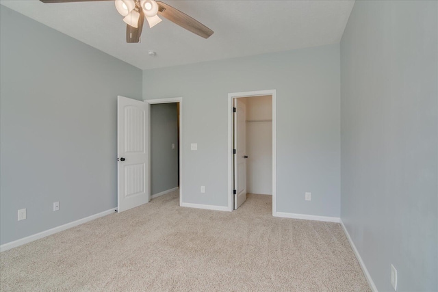 4909 Ashbrooke Way, Grovetown, GA 30813 - unfurnished bedroom featuring light colored carpet, a walk in closet, and a ceiling fan