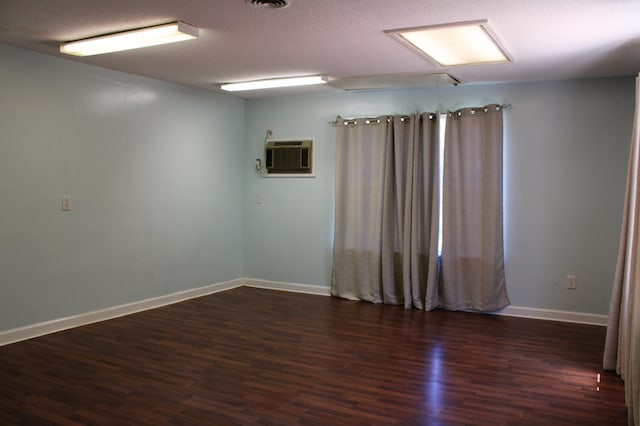 3711 Columbia Dr, Martinez, GA 30907 - unfurnished room with wood finished floors and a wall mounted air conditioner