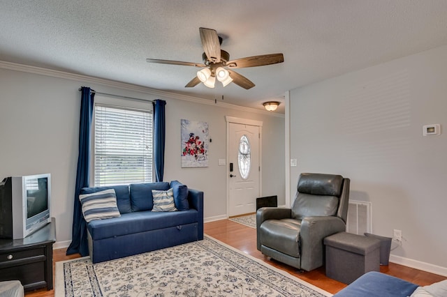 1414 Brookgreen Dr, North Augusta, SC 29841 - living area featuring ornamental molding, a ceiling fan, wood finished floors, and a textured ceiling