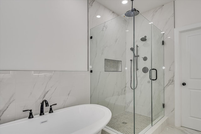 109 Dogwood Trl, Hephzibah, GA 30815 - full bath with a marble finish shower, a soaking tub, and tile walls