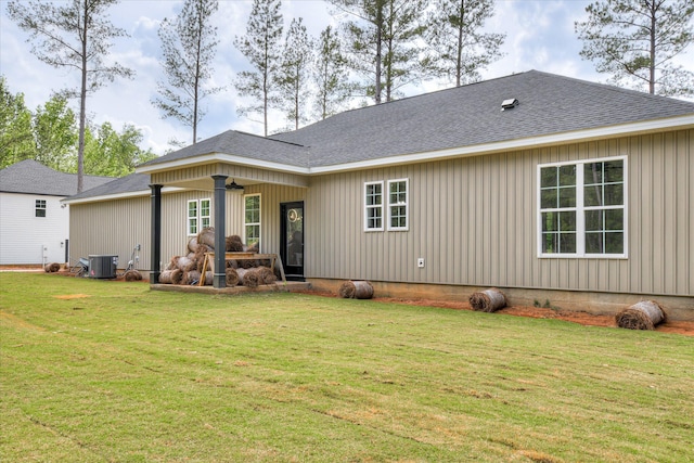 109 Dogwood Trl, Hephzibah, GA 30815 - rear view of house featuring central AC unit, ceiling fan, and a lawn