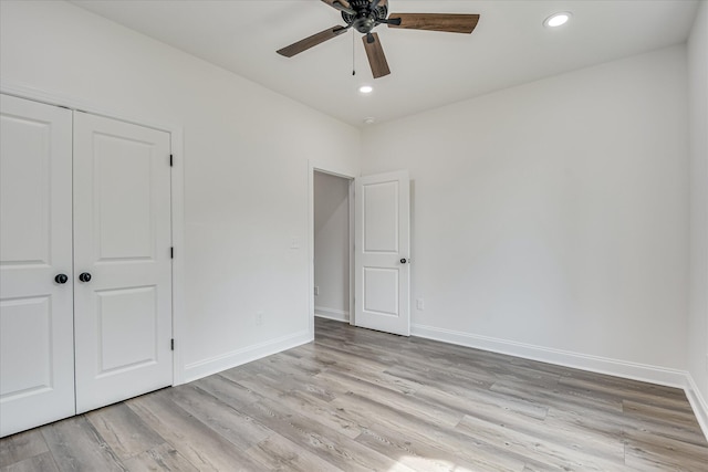 109 Dogwood Trl, Hephzibah, GA 30815 - unfurnished bedroom with light wood finished floors, a closet, recessed lighting, baseboards, and ceiling fan