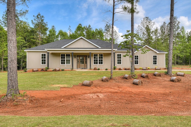 109 Dogwood Trl, Hephzibah, GA 30815 - view of front facade featuring a shingled roof, covered porch, and a front yard