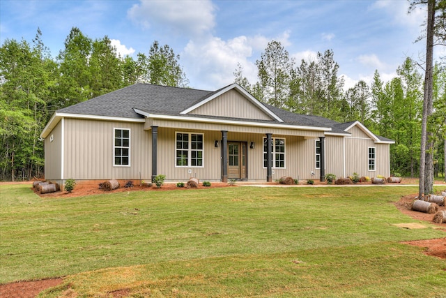 109 Dogwood Trl, Hephzibah, GA 30815 - view of front facade with covered porch, a front lawn, and a shingled roof