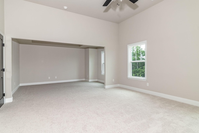 2421 Laurens St, Grovetown, GA 30813 - spare room with light carpet, ceiling fan, and baseboards