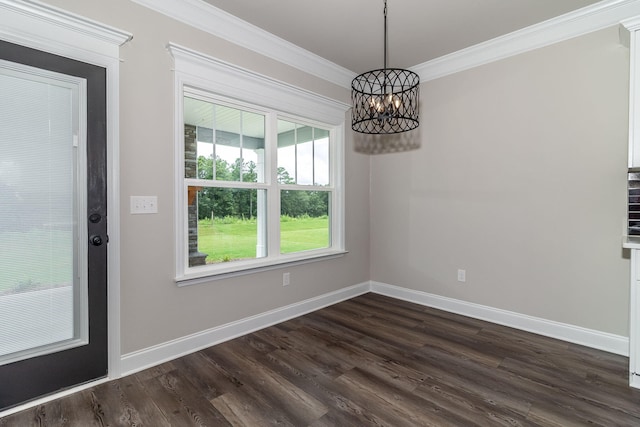 2421 Laurens St, Grovetown, GA 30813 - unfurnished dining area with a chandelier, dark wood-style flooring, ornamental molding, and baseboards