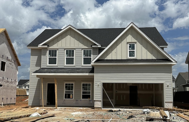 2421 Laurens St, Grovetown, GA 30813 - view of front facade with board and batten siding, a shingled roof, and a garage