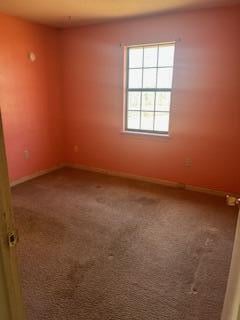 2838 Pepperdine Dr, Hephzibah, GA 30815 - spare room featuring baseboards and carpet
