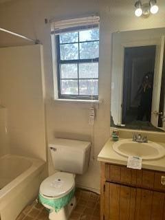 2838 Pepperdine Dr, Hephzibah, GA 30815 - bathroom featuring toilet, shower / washtub combination, and vanity