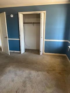2838 Pepperdine Dr, Hephzibah, GA 30815 - unfurnished bedroom featuring crown molding, carpet floors, and a closet