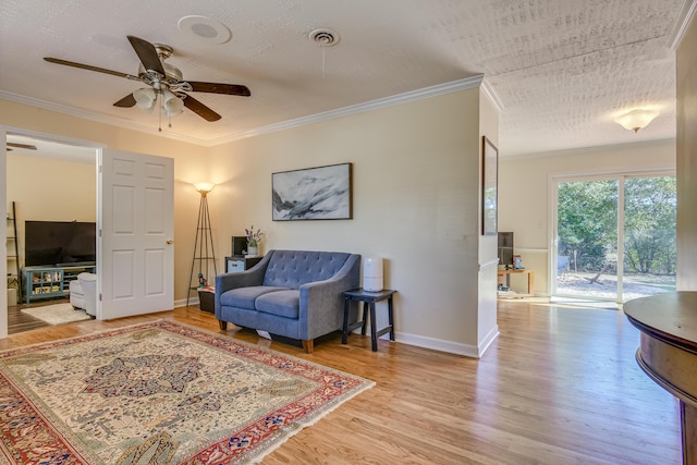 1612 Fairwood Dr, Augusta, GA 30909 - living area with a ceiling fan, ornamental molding, wood finished floors, and a textured ceiling
