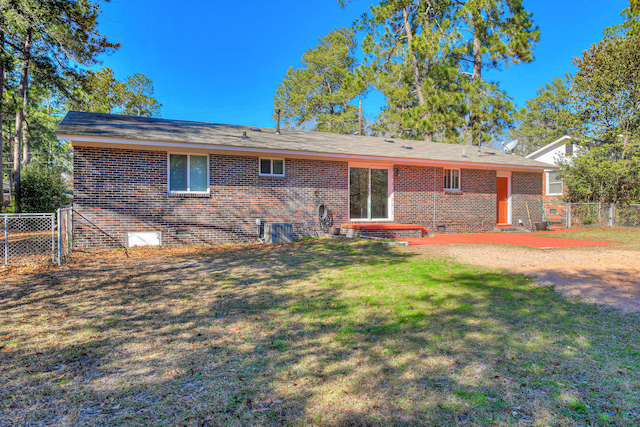 1612 Fairwood Dr, Augusta, GA 30909 - rear view of property with brick siding, crawl space, a patio area, and a gate