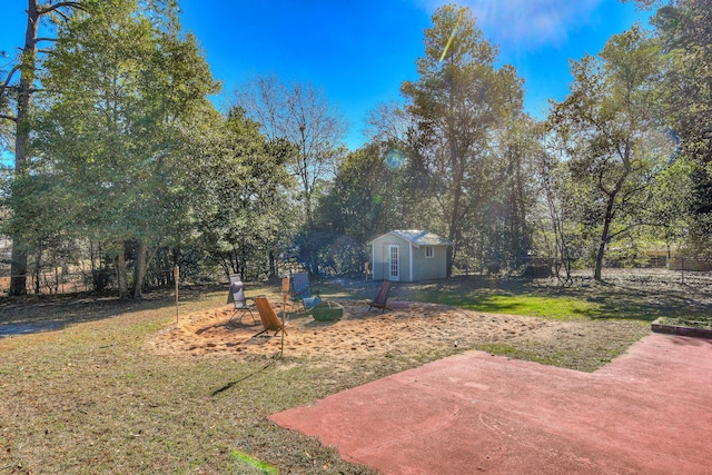 1612 Fairwood Dr, Augusta, GA 30909 - view of green lawn featuring a patio area, a shed, and an outdoor fire pit