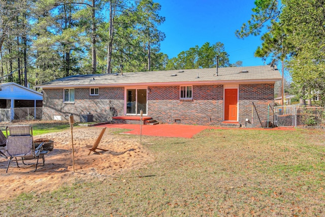 1612 Fairwood Dr, Augusta, GA 30909 - rear view of property featuring brick siding, crawl space, and a patio