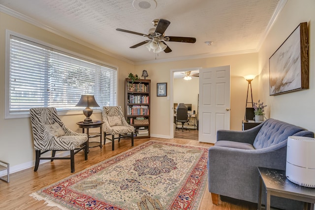 1612 Fairwood Dr, Augusta, GA 30909 - living room featuring a ceiling fan, crown molding, and wood finished floors