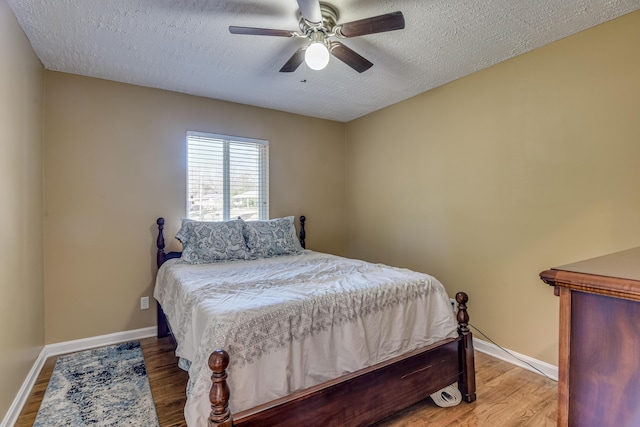 1612 Fairwood Dr, Augusta, GA 30909 - bedroom featuring a textured ceiling, wood finished floors, and a ceiling fan