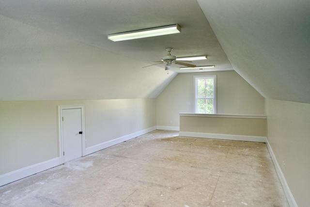 bonus room featuring ceiling fan and vaulted ceiling