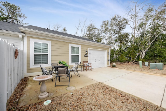 view of patio with a garage