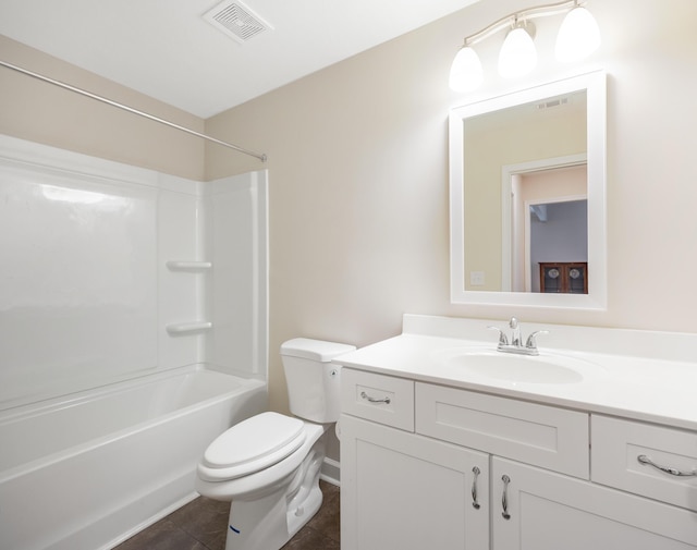 full bathroom with tile patterned flooring, vanity,  shower combination, and toilet