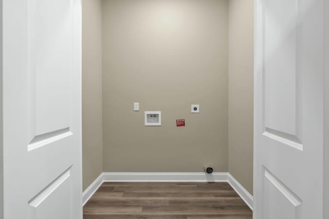 laundry room featuring electric dryer hookup, dark wood-type flooring, and washer hookup