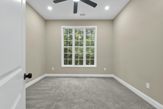 unfurnished room featuring carpet and ceiling fan