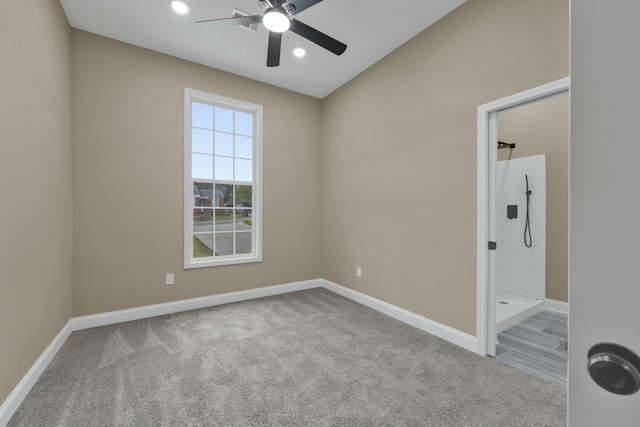 carpeted empty room with ceiling fan