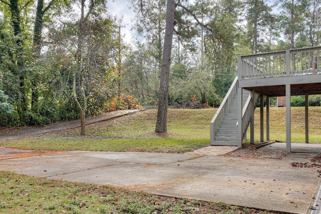 view of yard with a wooden deck