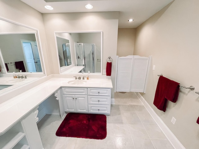 full bathroom featuring a stall shower, tile patterned flooring, vanity, and recessed lighting