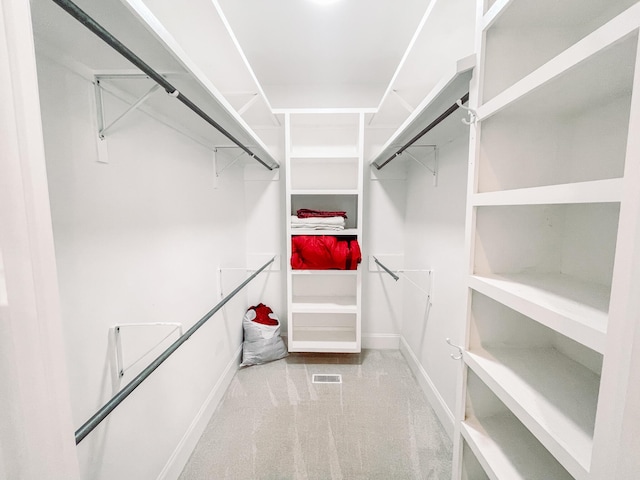 walk in closet featuring visible vents