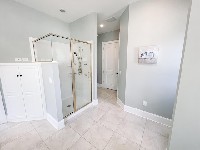 bathroom featuring a stall shower, recessed lighting, and baseboards