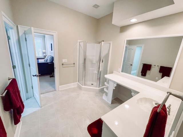 ensuite bathroom featuring visible vents, ensuite bathroom, a stall shower, vanity, and tile patterned floors