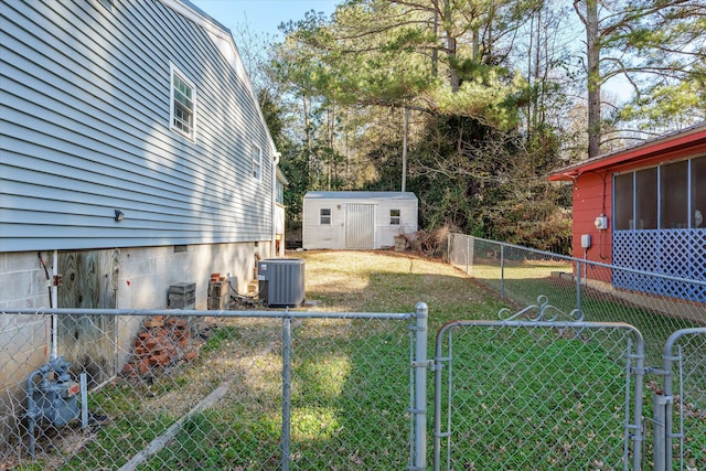 view of yard with central air condition unit