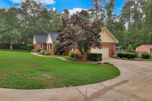 213 Oak Ln, Waynesboro, GA 30830 - view of front facade with brick siding, concrete driveway, and a front lawn