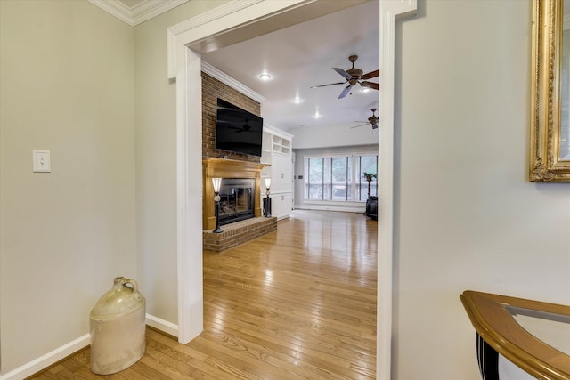 213 Oak Ln, Waynesboro, GA 30830 - hall featuring ornamental molding, baseboards, and light wood finished floors