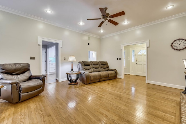 213 Oak Ln, Waynesboro, GA 30830 - living room with a ceiling fan, light wood finished floors, ornamental molding, baseboards, and recessed lighting