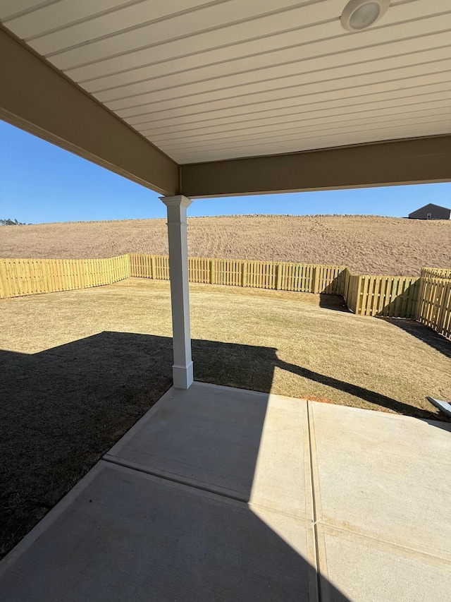 view of patio featuring a fenced backyard