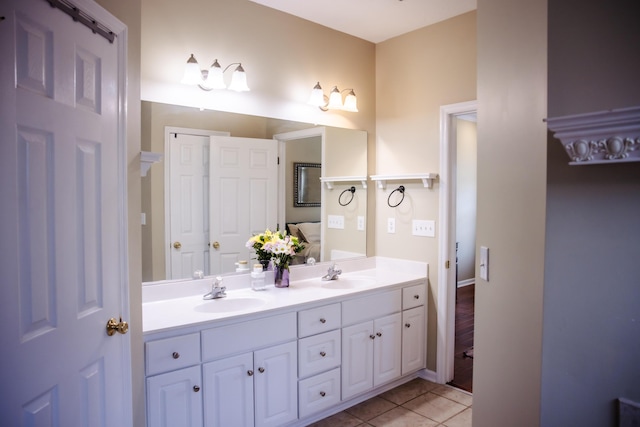 4725 Park Ridge Ct, Evans, GA 30809 - full bath with double vanity, a sink, and tile patterned floors