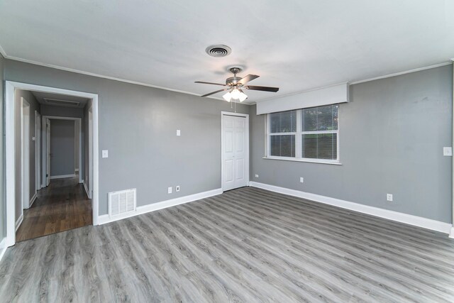 unfurnished room with ceiling fan and light hardwood / wood-style flooring