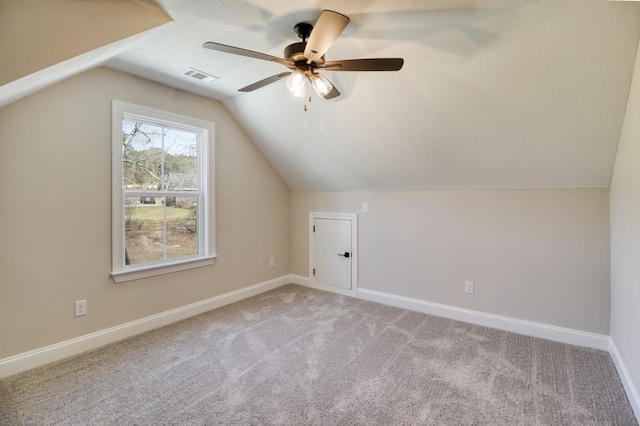 1086 Birdie Pl, Graniteville, SC 29829 - additional living space featuring carpet floors, baseboards, visible vents, a ceiling fan, and lofted ceiling