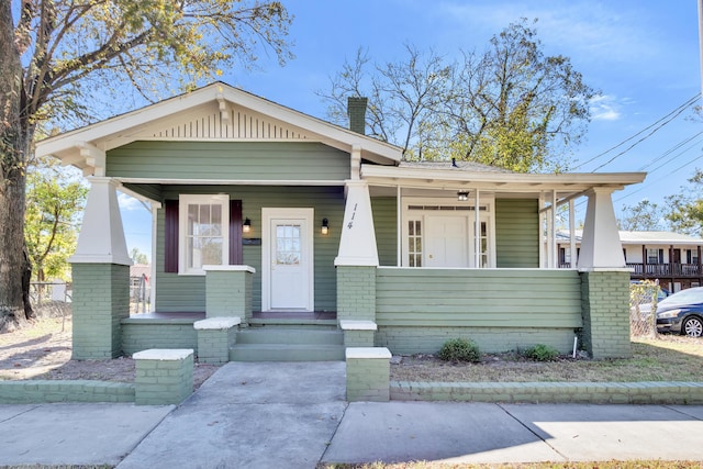 bungalow-style home with covered porch