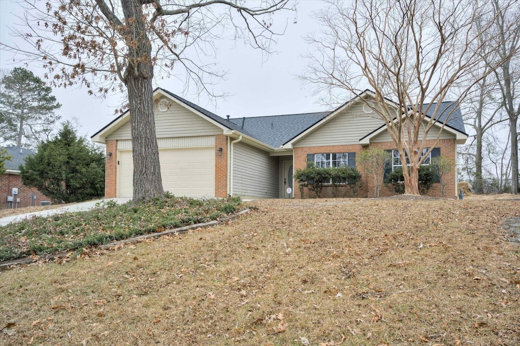 ranch-style home with a garage