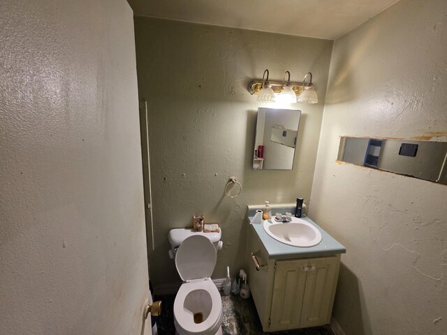 406 E Espinosa St, Augusta, GA 30901 - half bathroom featuring vanity and toilet